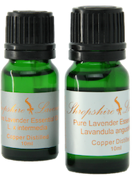 Two bottles of pure copper distilled lavender essential oil
